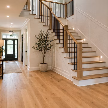 Finished staircase and hardwood flooring